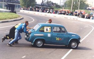 The maintenance collaborators help to take away the car