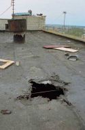 The hole in the roof of the 9-storey dwelling-house