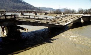 Wrecked by flood bridge