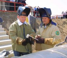 Leonid Kuchma wearing the electric welder uniform