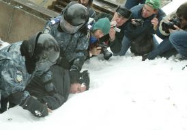 Photographers shoot arrest