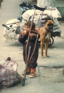 A kid from a poor family eats an apple