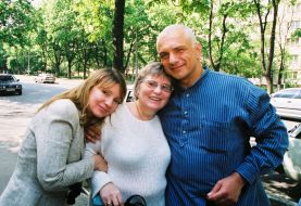 Yulia and Aleksandr Tymoshenko hug Lidiya Sokolchenko
