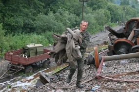 Emergency employeer takes out protection clothes