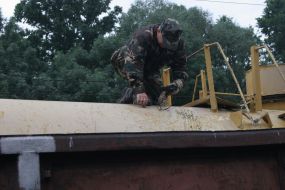 Emergency employeers checks the yellow phosphorus tank