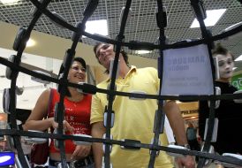 «The Whole world is in your hands» sculpture of mobile telephones