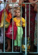 A girl looks after events on the stage