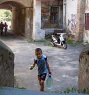 Boy bearing water