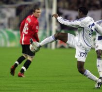 Ayila Yussuf and Wayne Rooney