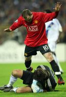 Aleksandr Shovkovskiy and Wayne Rooney