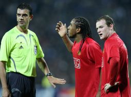 Viktor Kassai, Wayne Rooney and Anderson