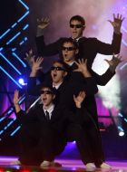 Group of acrobats ”Men in black”