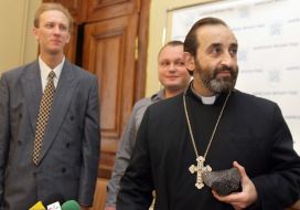 Handing the stone from the mountain Ararat to Armenian church in Lvov