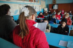 Pupils at the lesson at school without heating