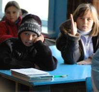 Pupils at the lesson at school without heating