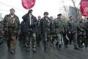 Сeremony of flowers laying in Garden of warrior-internationalist