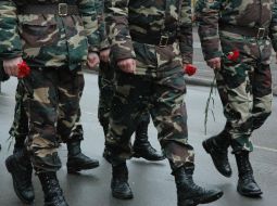 Сeremony of flowers laying in Garden of warrior-internationalist