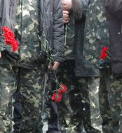 Сeremony of flowers laying in Garden of warrior-internationalist