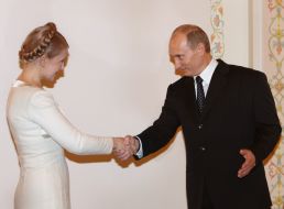 Yuliya Timoshenko and Vladimir Putin. Meeting