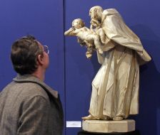 ”Sainted Felix with a child”