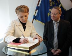 Yuliya Timoshenko and  Luis Maria de Puig