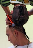 ”Head first hair-cutting”