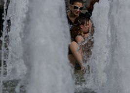 Young people near a fountain