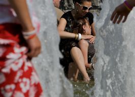 Young people near a fountain
