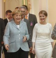 Юлия Тимошенко,  Ангела Меркель и Григорий Немыря