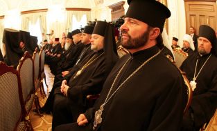 Священники