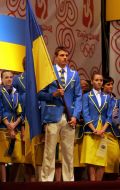 Sergey Demidyuk holding flag
