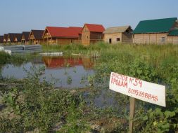 Flooded boating station in village Mayaki