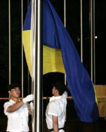 Hoisting an Ukrainian flag