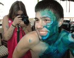 Girl shots the festival participant