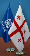 Small flags of GUAM and Georgia