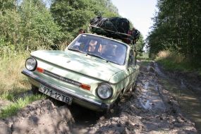 Fellows pushing a car