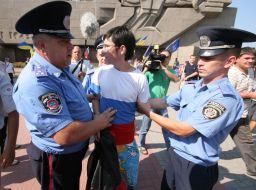 Militiamen arresting the activist of prorossiyskiye organizations