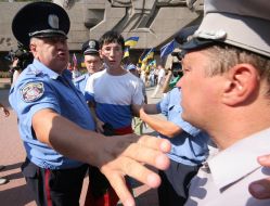 Militiamen arresting the activist of prorossiyskiye organizations