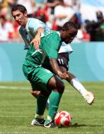 Olubayo Adefemi and Angel Di Maria