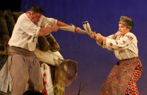 Natalia Sumskaya as Odarka and Bogdan Benyuk as Karas