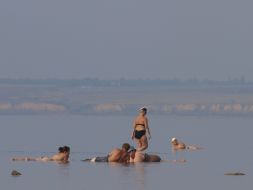 Holiday-makers are taking baths of muds