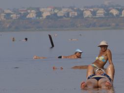 Holiday-makers are taking baths of muds