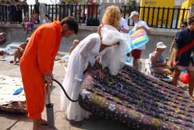 Participants of races on mattresses