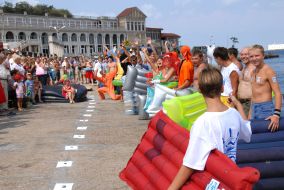 Participants of races on mattresses