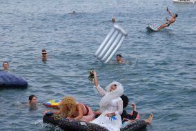 Participants of races on mattresses