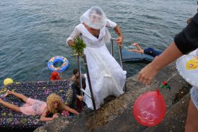Participants of races on mattresses