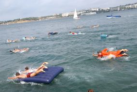 Participants of races on mattresses