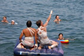 Participants of races on mattresses