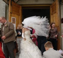Bride going out of the church after the wedding ceremony
