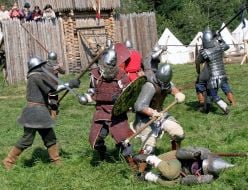 Participants of show of recreation of medieval knights duels